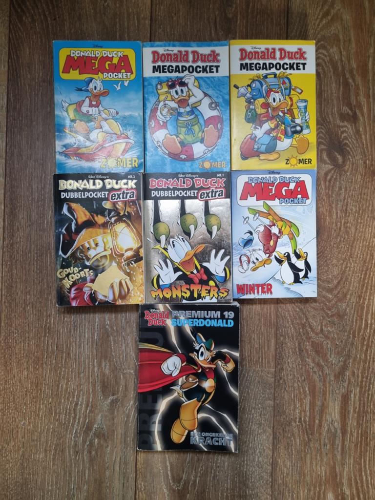 Donald Duck Mega/Dubbelpocket/Premium - 7 stripboeken, Meerdere stripboeken, Ophalen of Verzenden, Gelezen