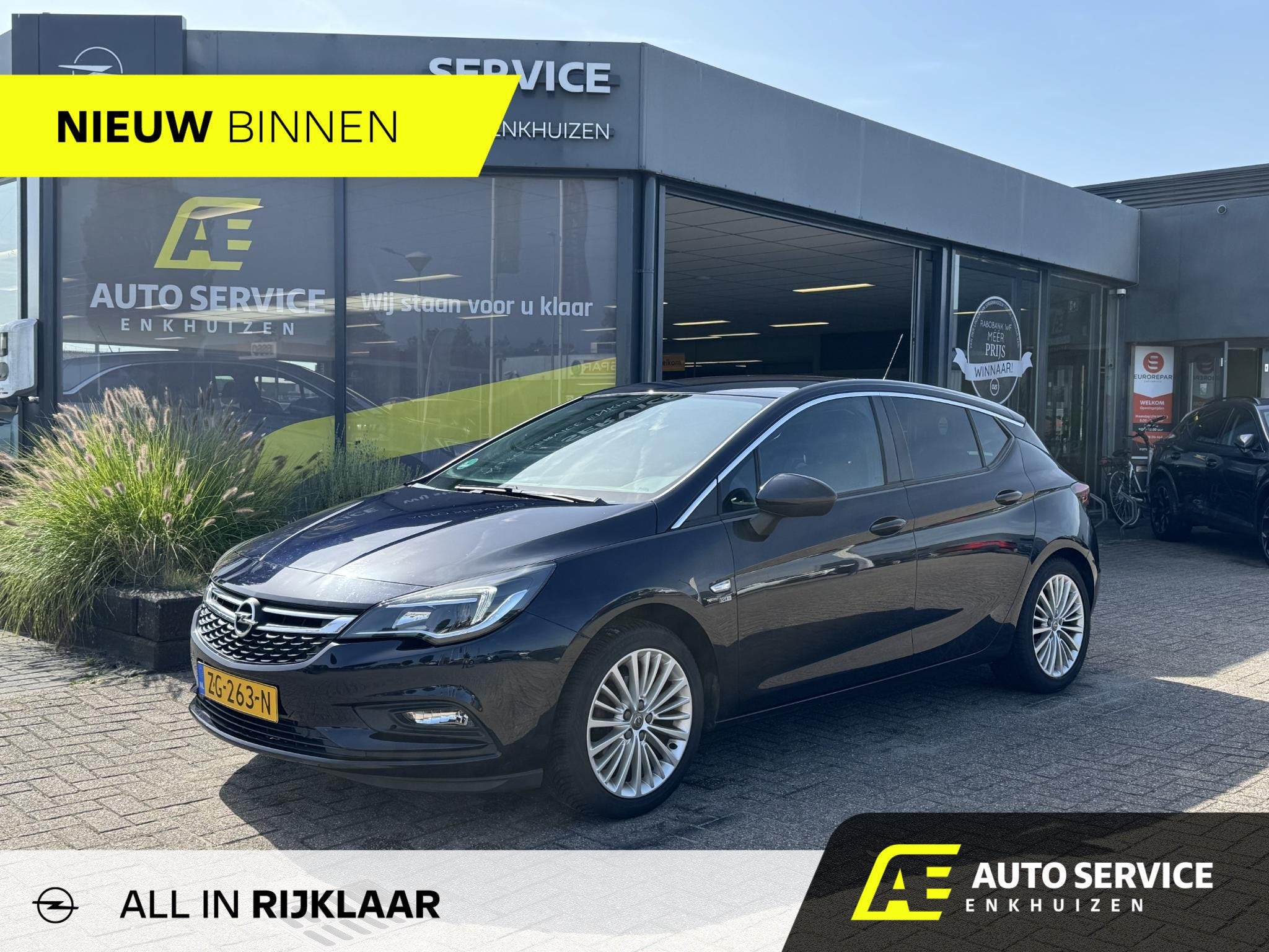 Opel Astra 1.0 Turbo 120 Jaar Edition Rijklaar inclusief gar, Auto's, Opel, 12 maanden, Stof, Gebruikt, Blauw