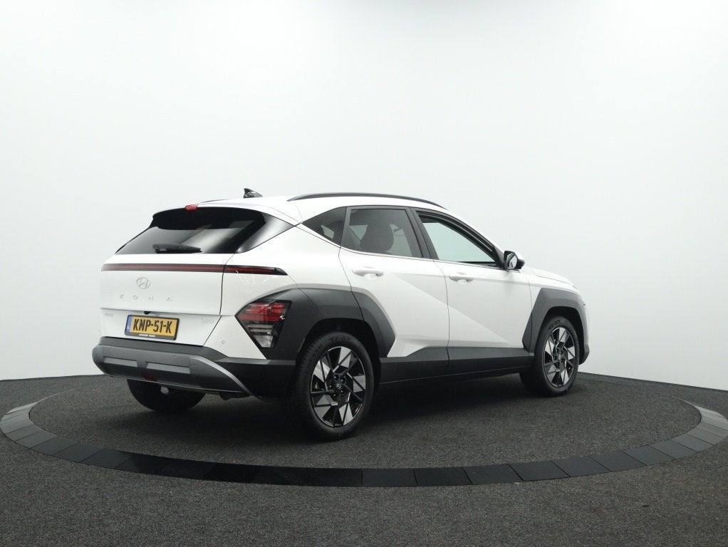 Hyundai KONA 1.6 GDI HEV Premium | Licht interieur | Private, Auto's, 12 maanden, Gebruikt, Wit, Leder