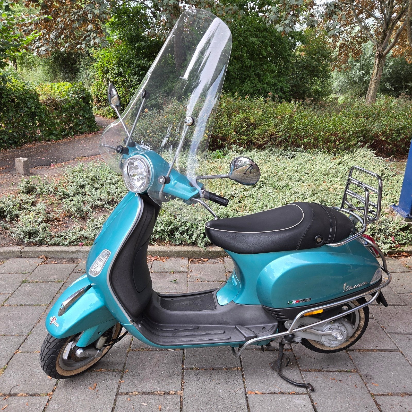 Te koop: mooie turquoise Vespa LX 50 4T met windscherm, Fietsen en Brommers, Scooters | Vespa, Ophalen, Gebruikt, Benzine, 50 cc