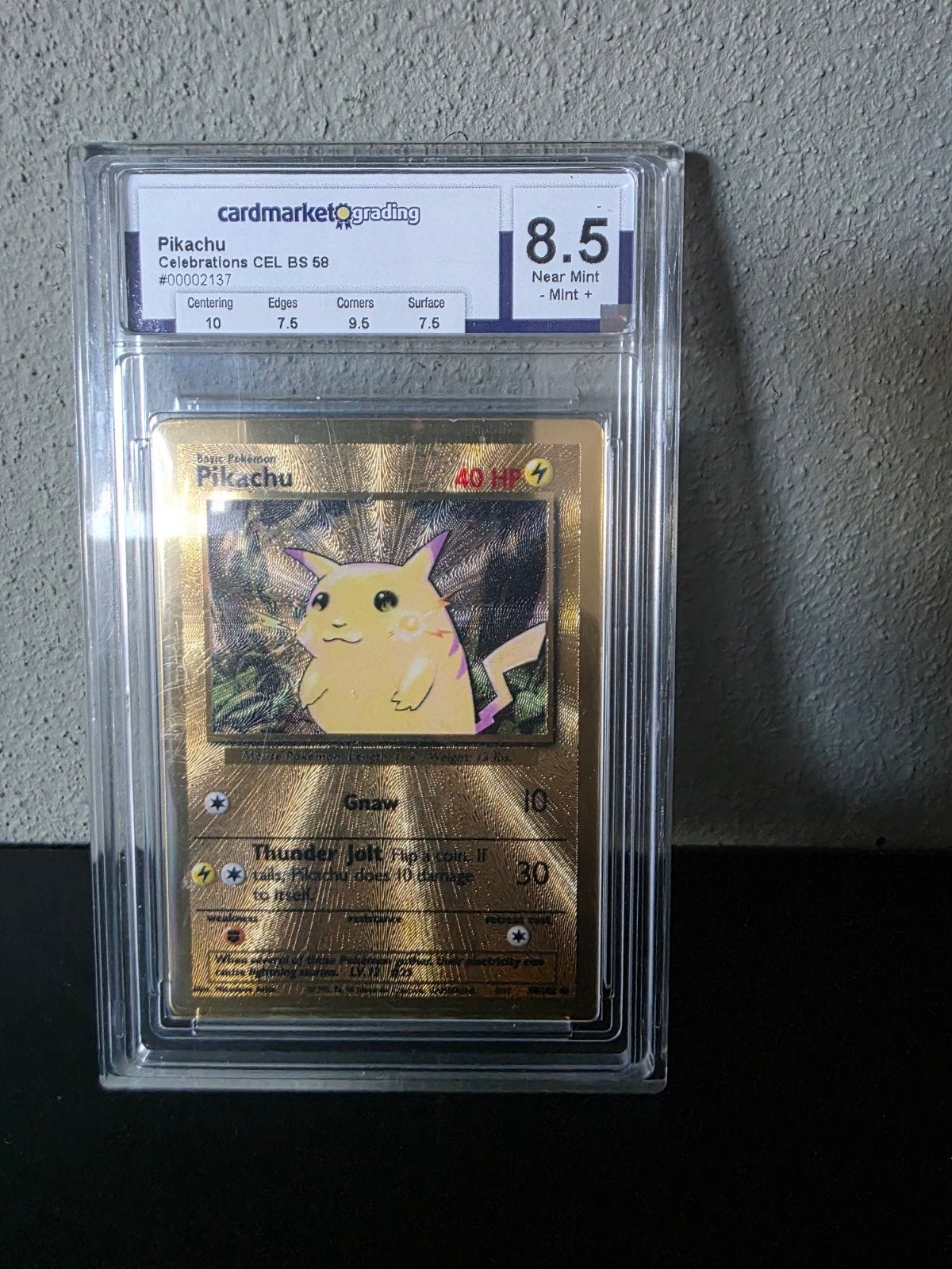 Pikachu V Celebrations Metalen Promo BS 58 - Graded 8.5, Ophalen of Verzenden