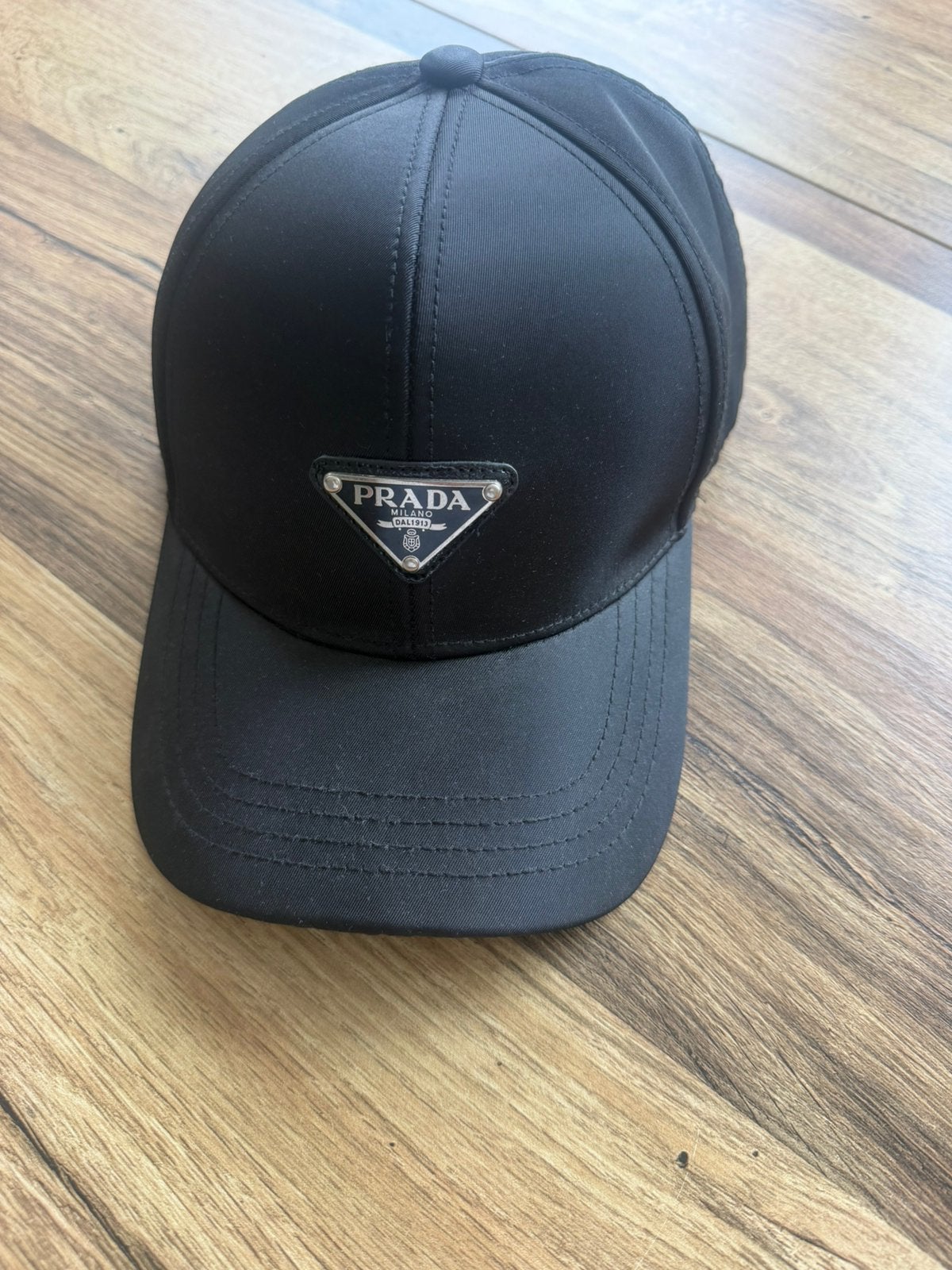 Prada cap, Ophalen of Verzenden, Zo goed als nieuw
