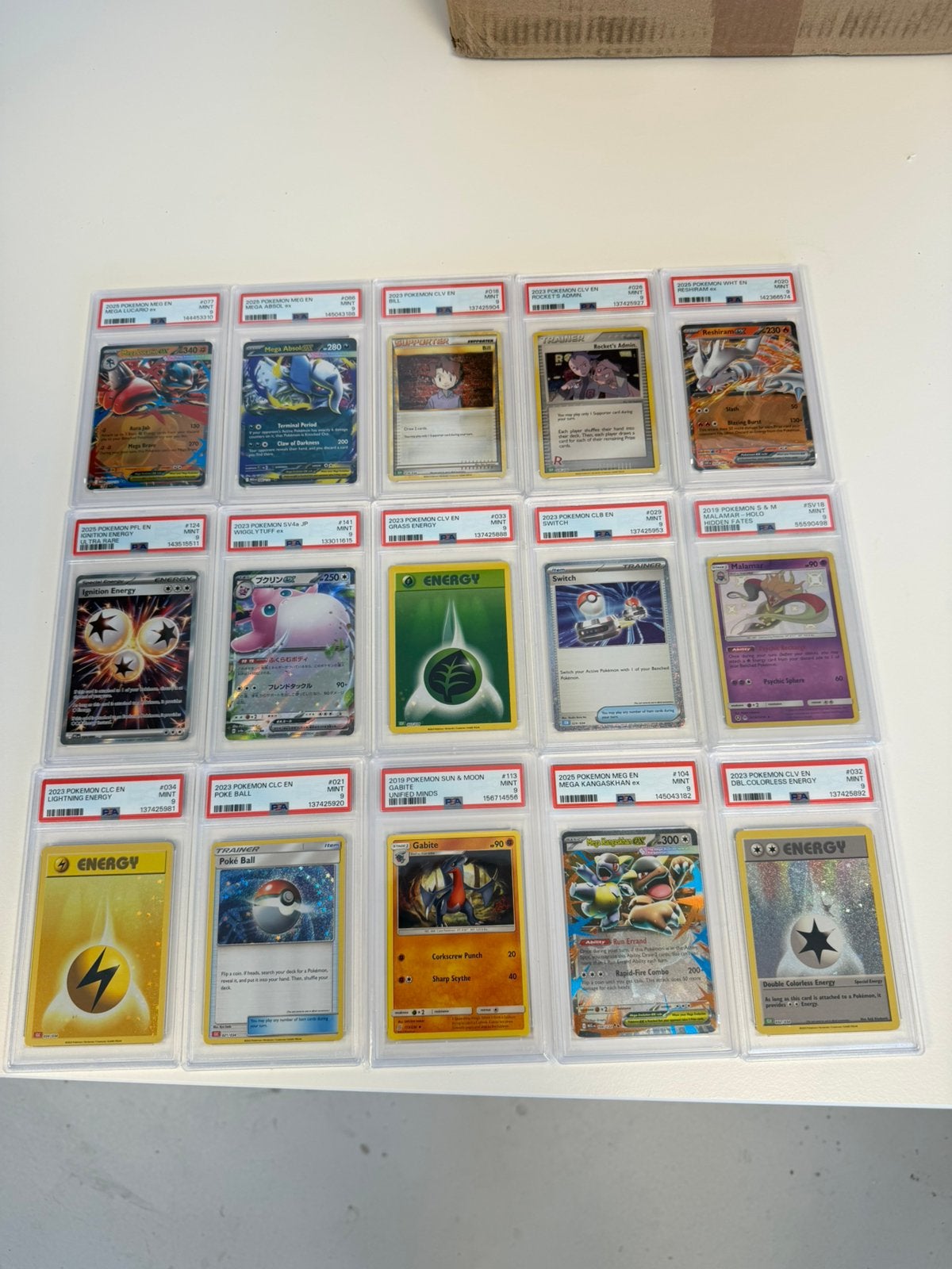 15x Pokémon PSA 9 Slabs Partij Lot in 1 Koop 15 graded slab, Ophalen of Verzenden, Zo goed als nieuw, Meerdere kaarten, Foil