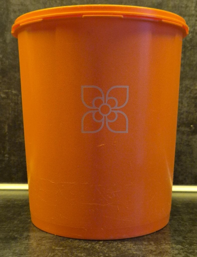 Tupperware trommel met sterdeksel Oranje met bloem..., Huis en Inrichting, Keuken | Tupperware, Ophalen of Verzenden, Zo goed als nieuw