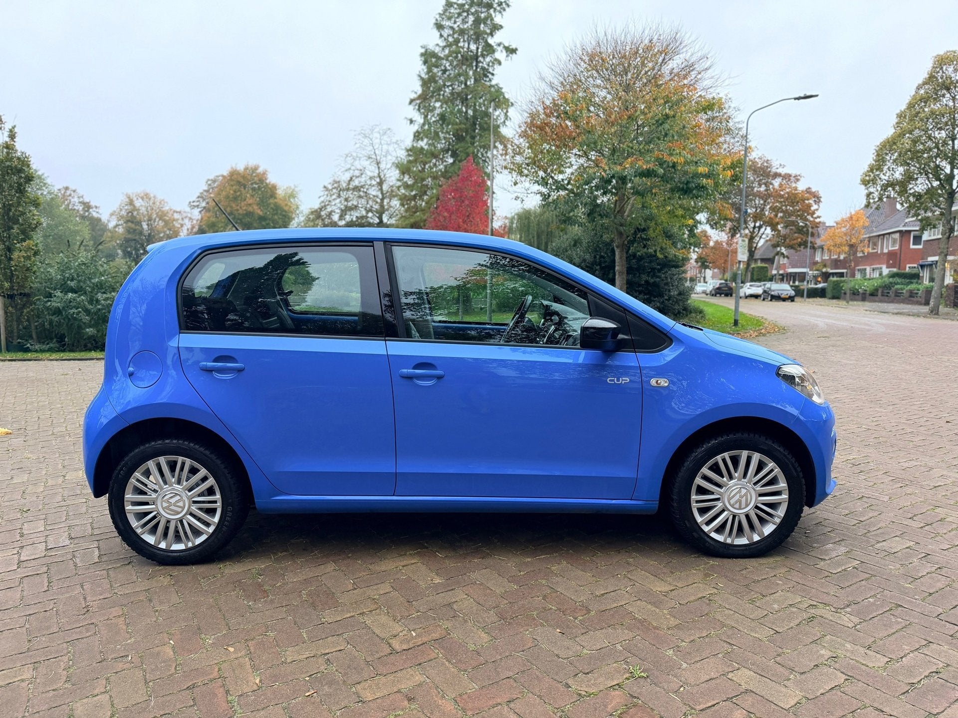 Volkswagen Up! 1.0 high up! CUP | 5deurs | Stoelverw. | Airc, Auto's, Voorwielaandrijving, Stof, Gebruikt, Bedrijf