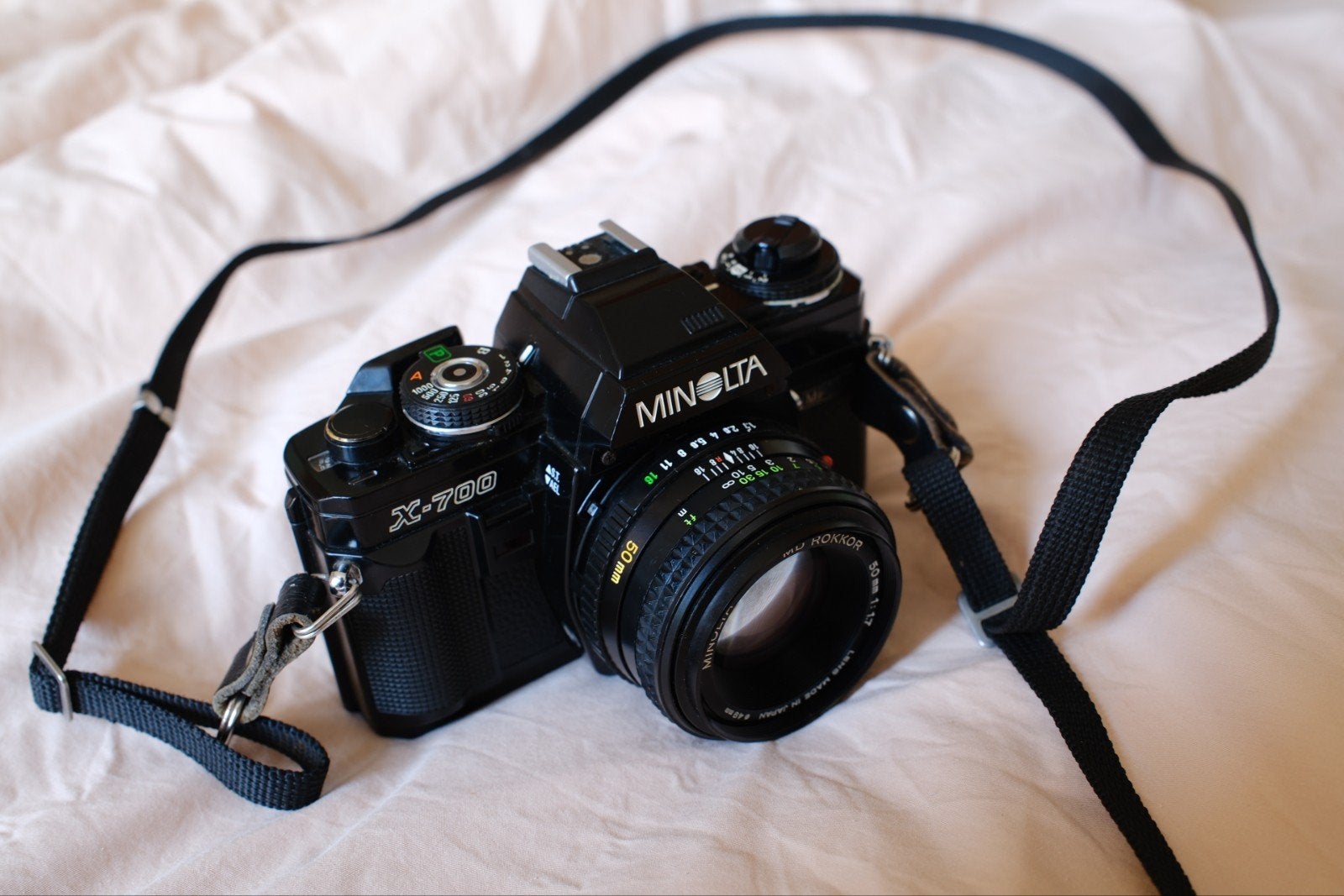 Minolta X700 (Defecte condensator?) / objectieven, Audio, Tv en Foto, Fotocamera's Analoog, Ophalen of Verzenden, Spiegelreflex