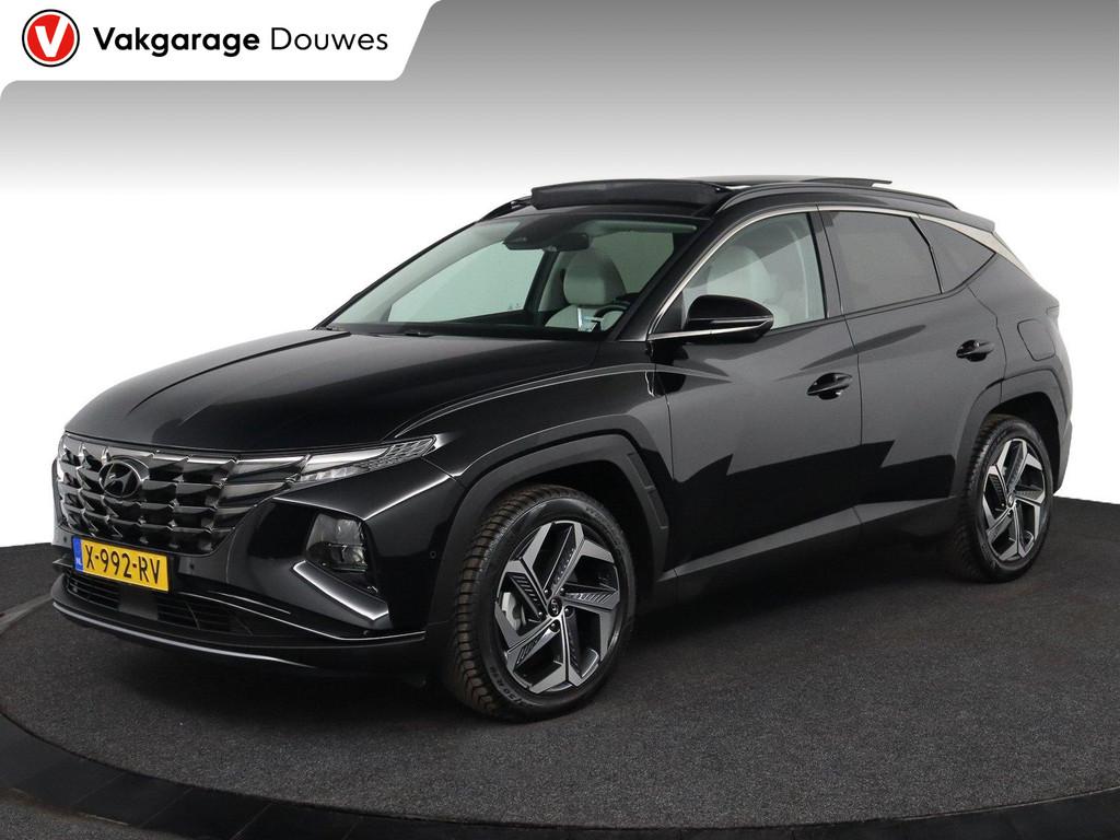 Hyundai Tucson 1.6 T-GDI HEV Premium Sky | Automaat | Bomvol, Auto's, Gebruikt, Euro 6, 4 cilinders, 1650 kg