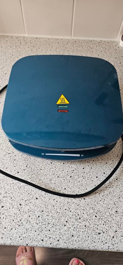 Wafelijzer Quigg, Ophalen, Gebruikt
