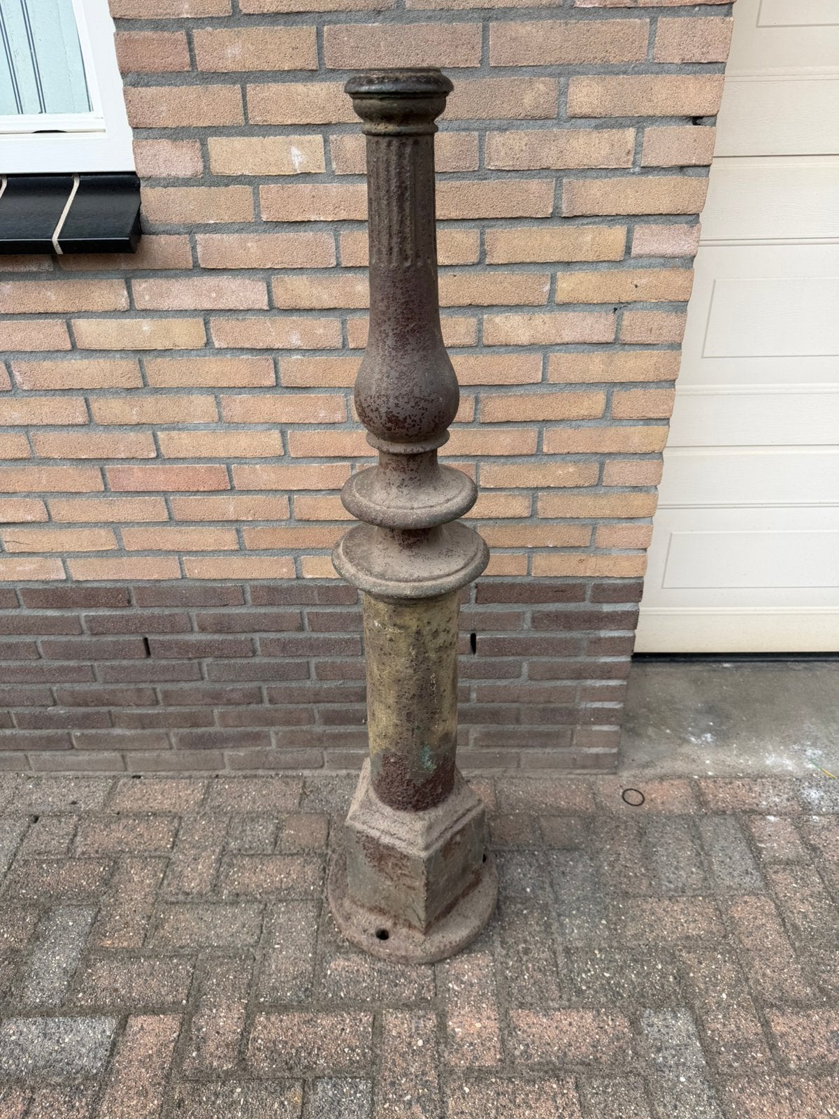 Zware gietijzeren paal, Ophalen, Gebruikt
