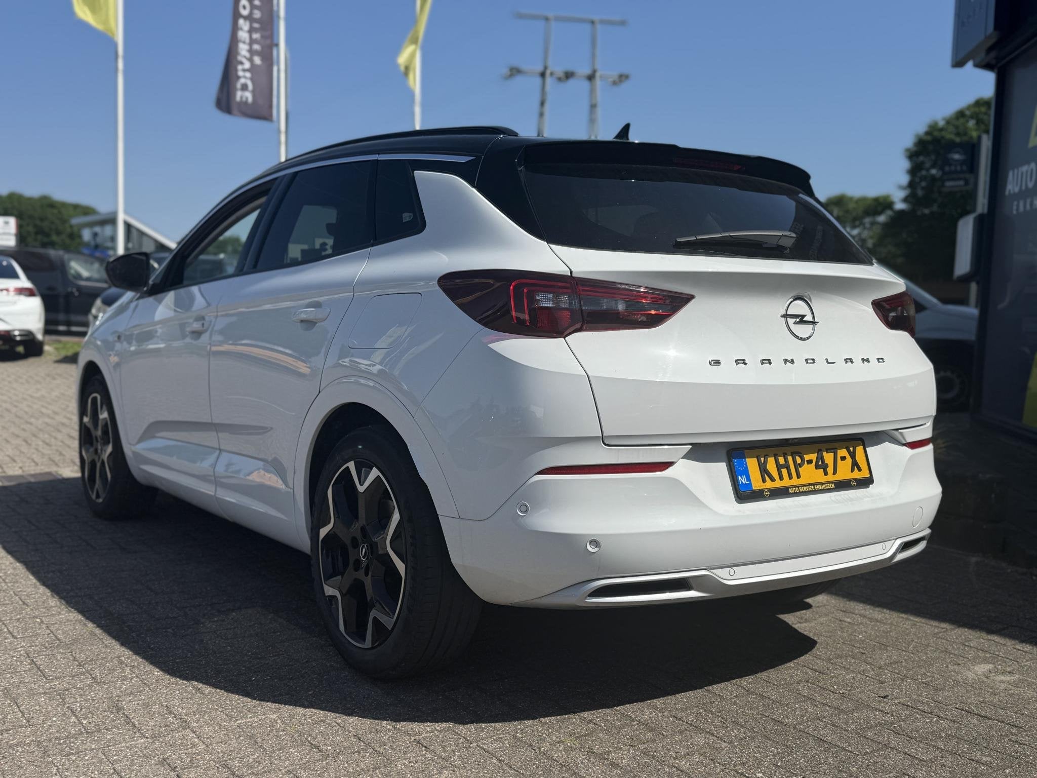 Opel Grandland 1.6 Turbo Plug-In Hybrid 4x4 Ultimate Als nie, Auto's, 12 maanden, Euro 6, 4 cilinders, Alcantara
