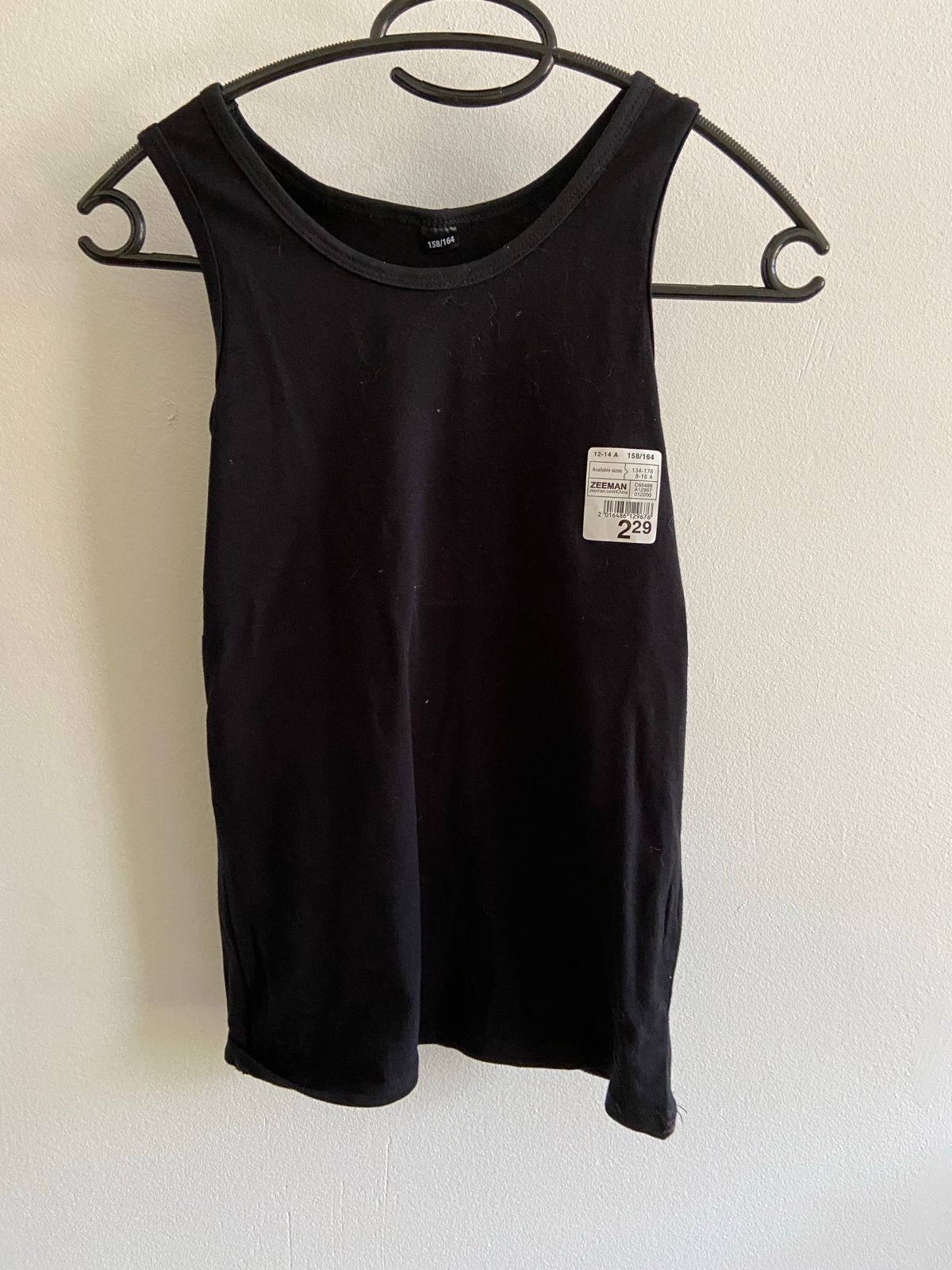 Nieuwe zwarte effen kinder top Zeeman maat 158/164, Kinderen en Baby's, Kinderkleding | Maat 158, Ophalen of Verzenden, Nieuw