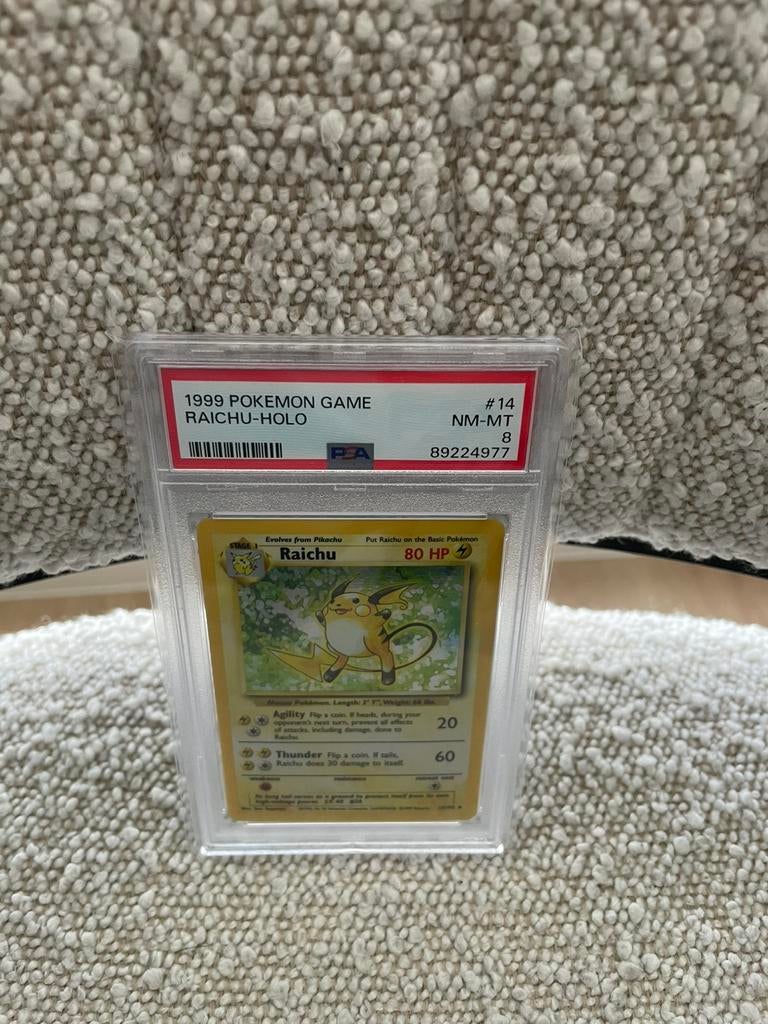 Raichu holo 14/102 psa 8, Ophalen of Verzenden, Zo goed als nieuw
