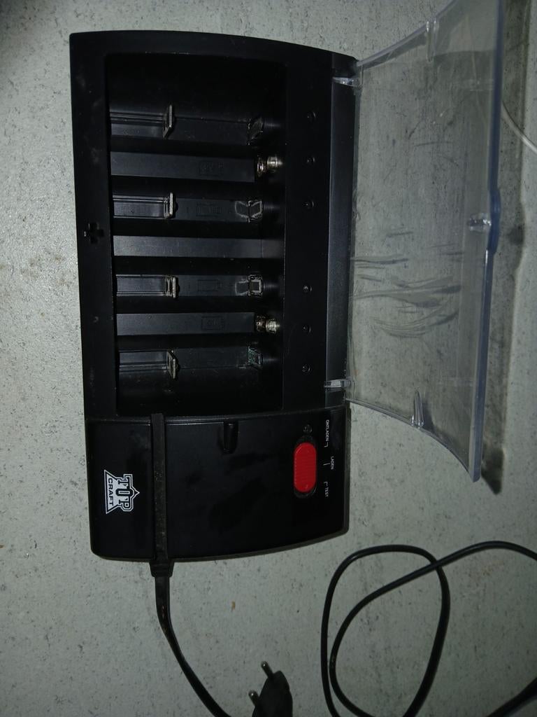 Batterij lader, Ophalen of Verzenden, Zo goed als nieuw