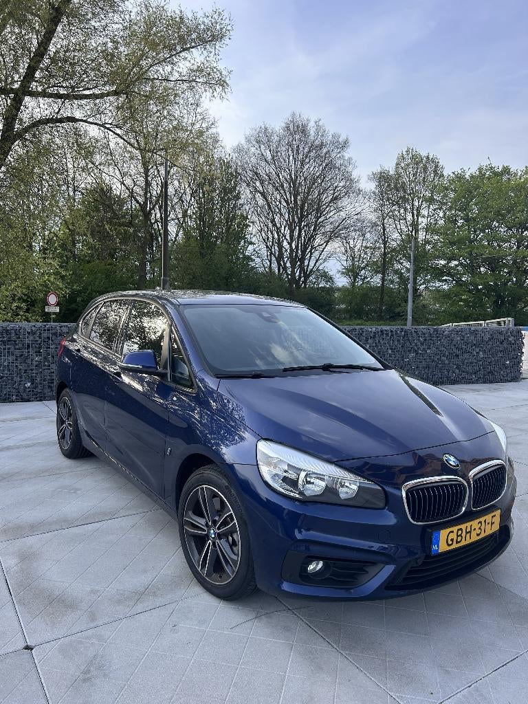BMW 2-Serie Active Tourer 225xe 224pk Aut 2017 Blauw, Auto's, BMW, Automaat, 136 pk, Plug-in hybride, Vierwielaandrijving