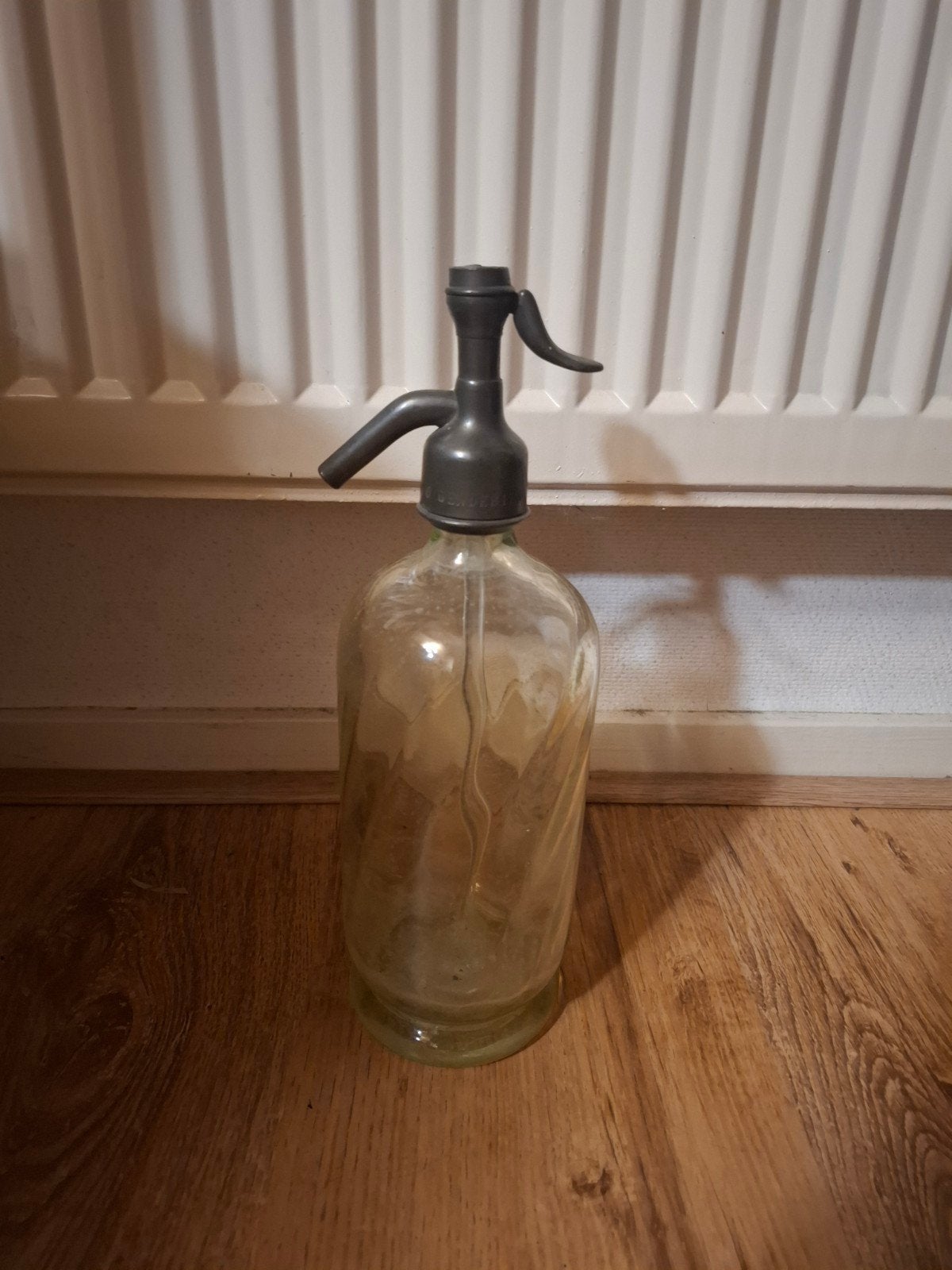 water spuit fles antiek, Ophalen