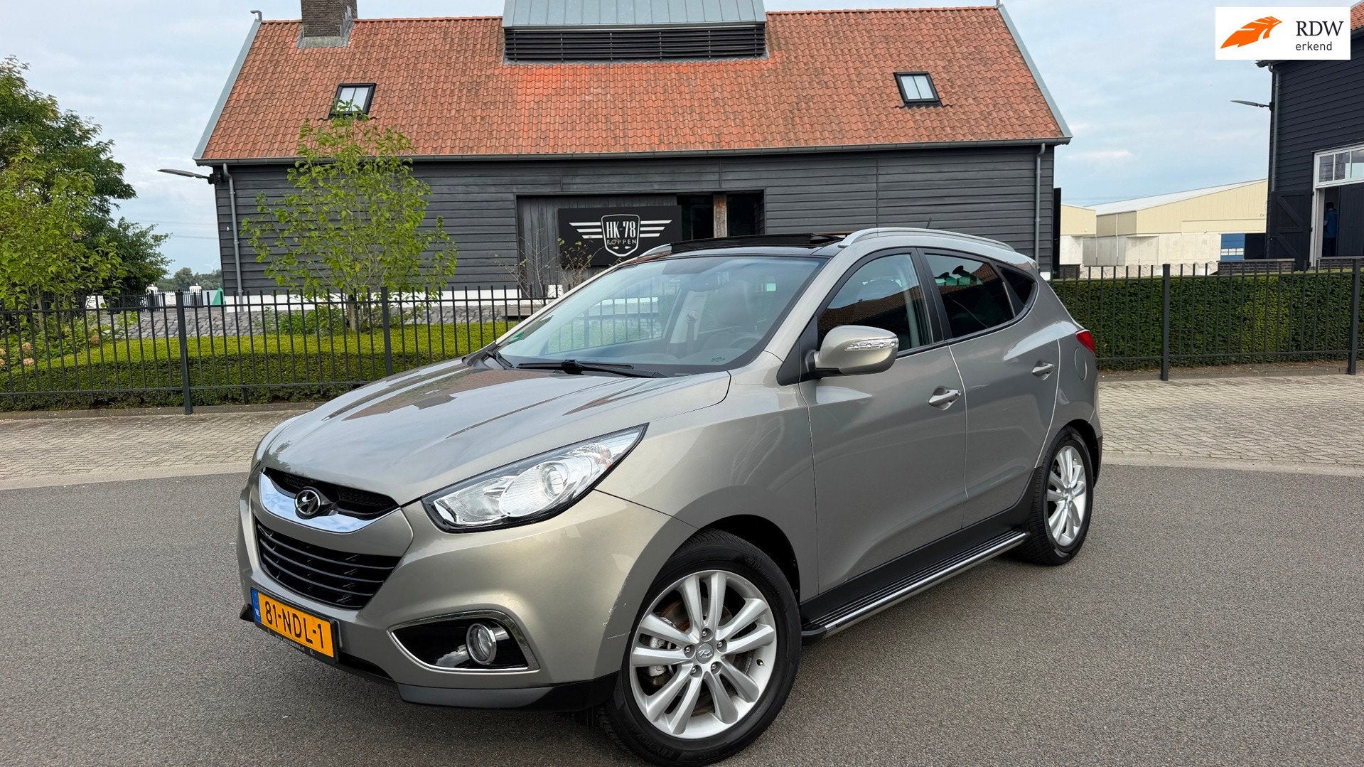 Hyundai Ix35 2.0i i-Catcher AUTOMAAT PANORAMDAK LEER NAVI TR, Auto's, Gebruikt, Zwart, 4 cilinders, 163 pk