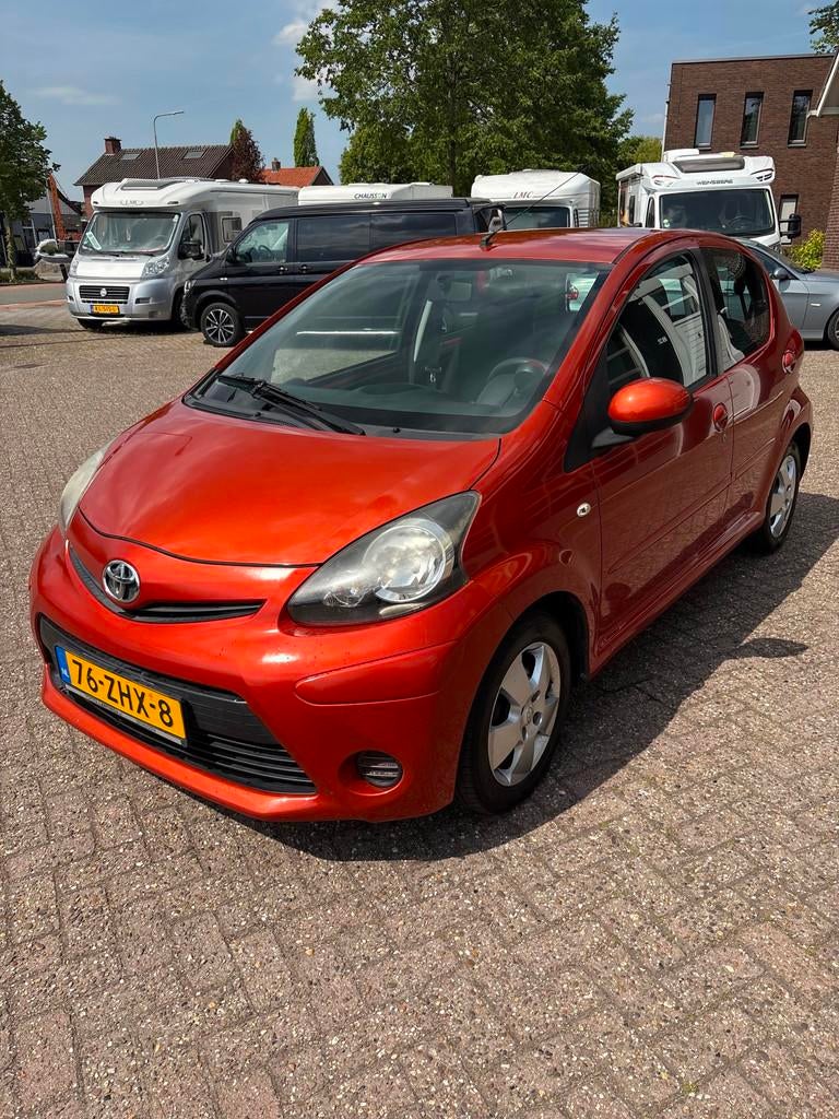 Toyota Aygo 1.0 VVT-i Comfort Orange Centrale Airco, Voorwielaandrijving, Euro 5, Stof, Gebruikt