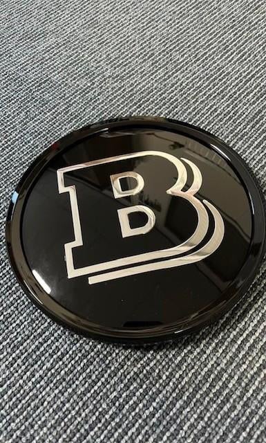 Origineel brabus grill embleem brabus logo C-klasse gle glc, Auto diversen, Tuning en Styling, Ophalen of Verzenden