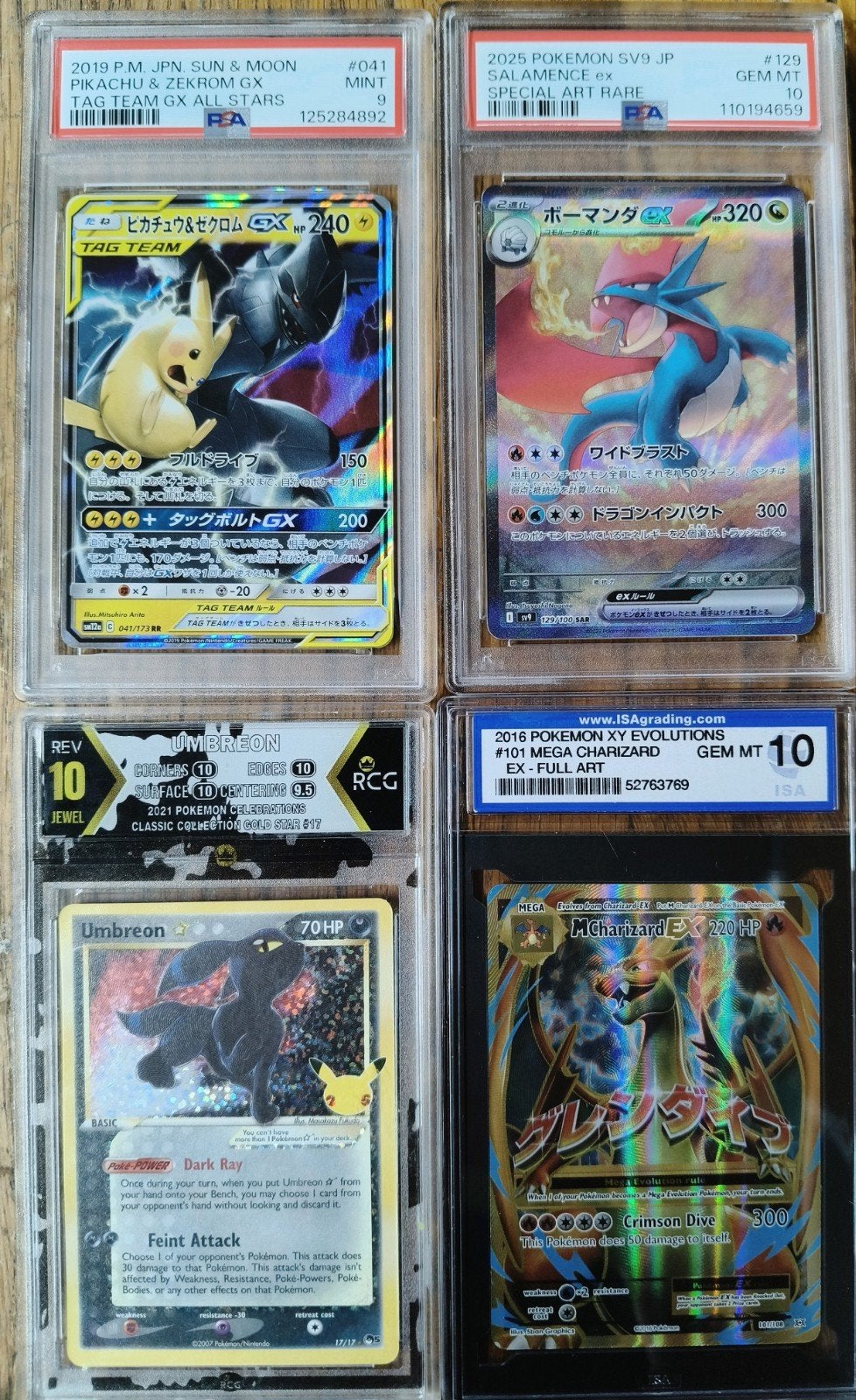 4x Graded Pokémon charizard Pikachu Salamence Umbreon& Char, Ophalen of Verzenden, Zo goed als nieuw, Meerdere kaarten