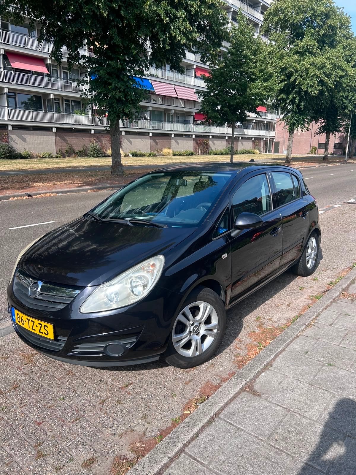 Opel Corsa 1.2 16V 5D WR 2007 Zwart, Auto's, Opel, Voorwielaandrijving, 4 cilinders, 1229 cc, Origineel Nederlands