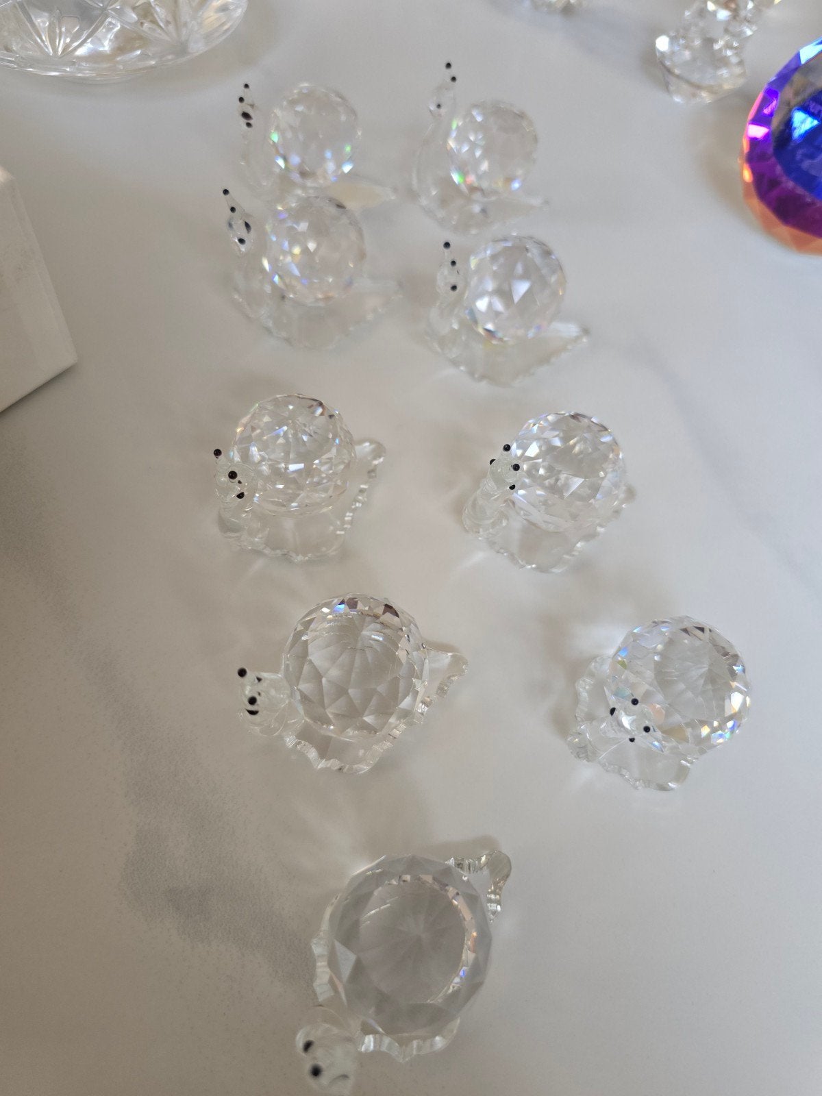 9 kristallen slakken beeldjes, Antiek en Kunst, Antiek | Glas en Kristal, Ophalen