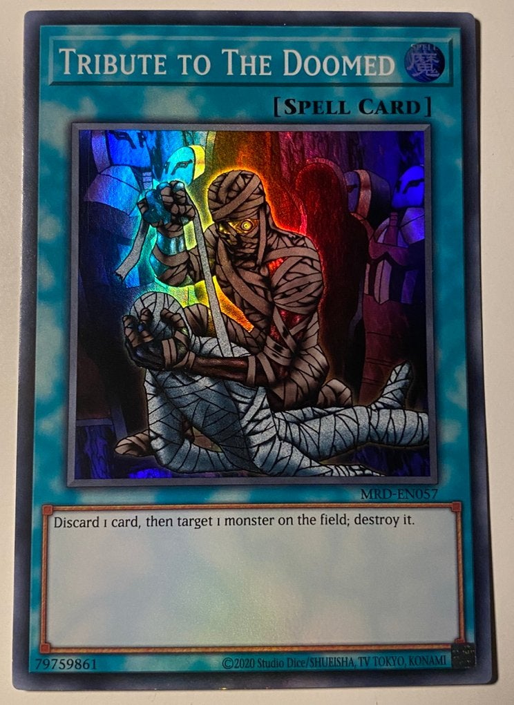 Yu-Gi-Oh! Tribute to the Doomed MRD Print !, Ophalen of Verzenden, Zo goed als nieuw, Losse kaart, Foil