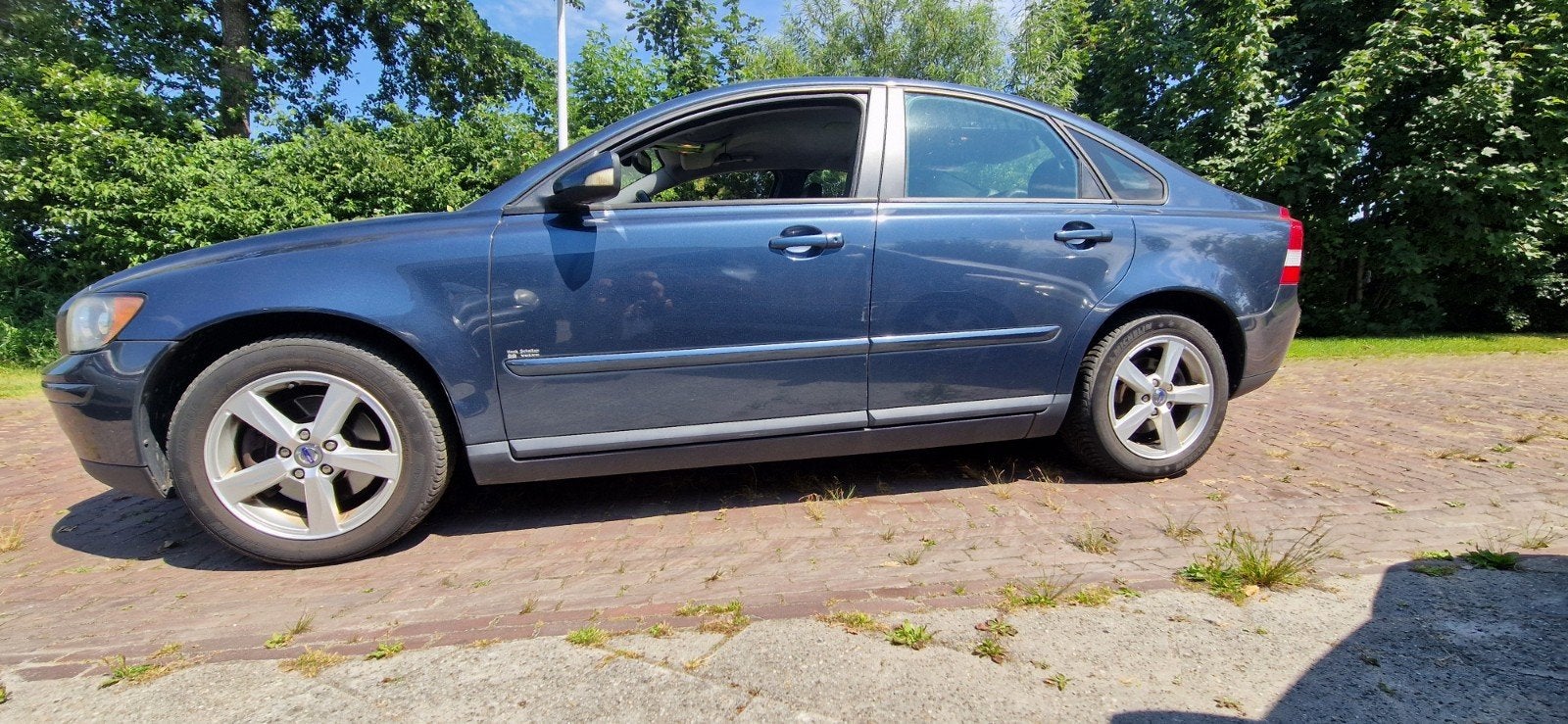 Volvo S40 2.4 I 103KW AUTOMAAT 2006 Leer Clima Navi, Auto's, Zwart, 700 kg, Blauw, 2435 cc