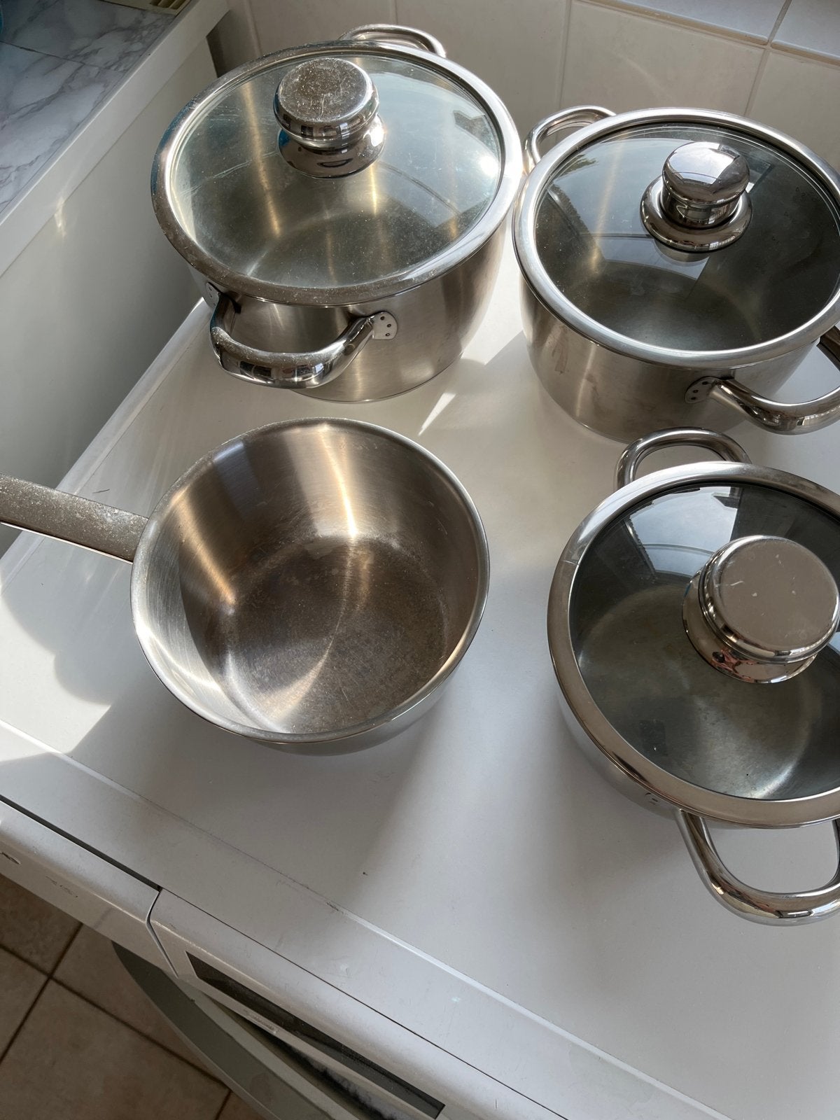 Gero Pannenset RVS met glazen deksels - 4-delig, Gebruikt, Pannenset, Ophalen of Verzenden, Rvs