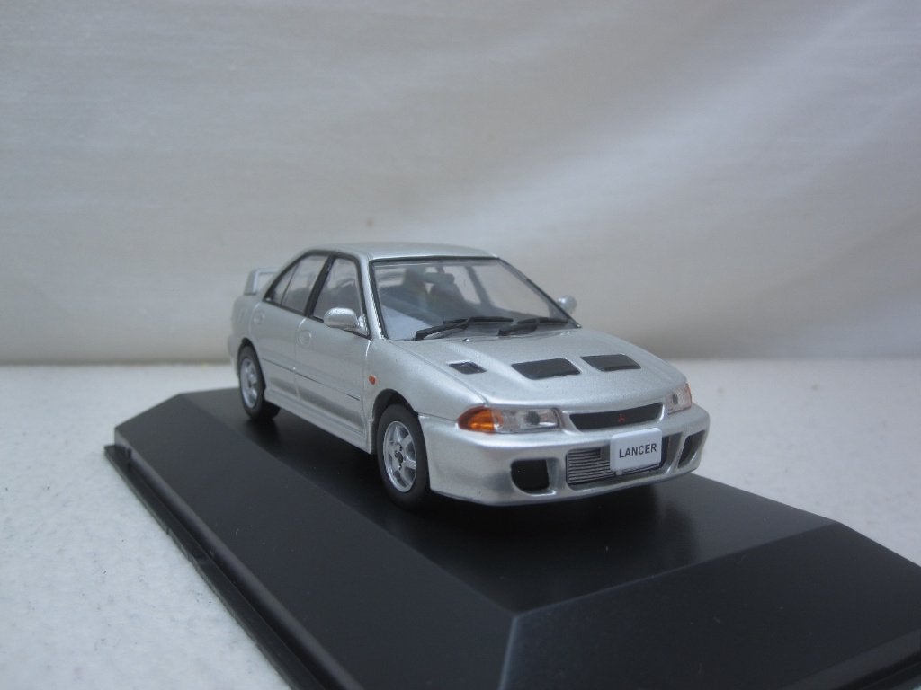 Mitsubishi Lancer RS Evolution 1992 1:43 First43, Ophalen of Verzenden, Nieuw, Auto, Overige merken