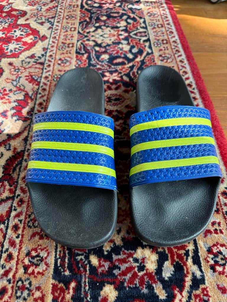 Adidas Adilette Slippers - Blauw/Geel, Ophalen of Verzenden, Gedragen, Blauw