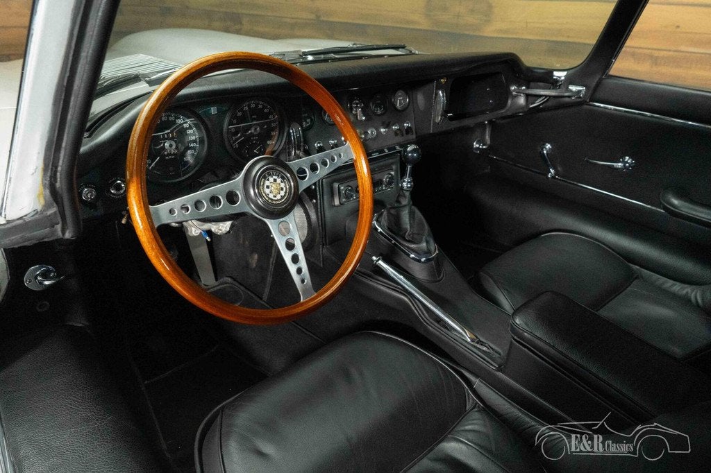 Jaguar E-type Series 1 Coupé | 1964, Auto's, Lederen bekleding, Achterwielaandrijving, Zwart, Leder