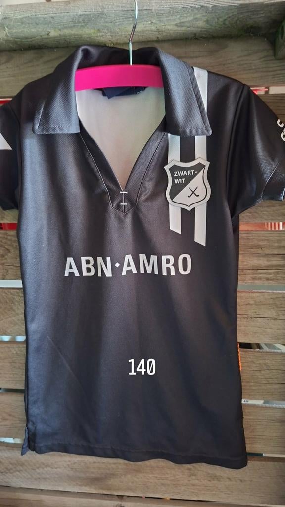 Zwart-Wit Hockey Shirt ABN AMRO Maat 140, Kinderen en Baby's, Kinderkleding | Maat 140, Ophalen of Verzenden