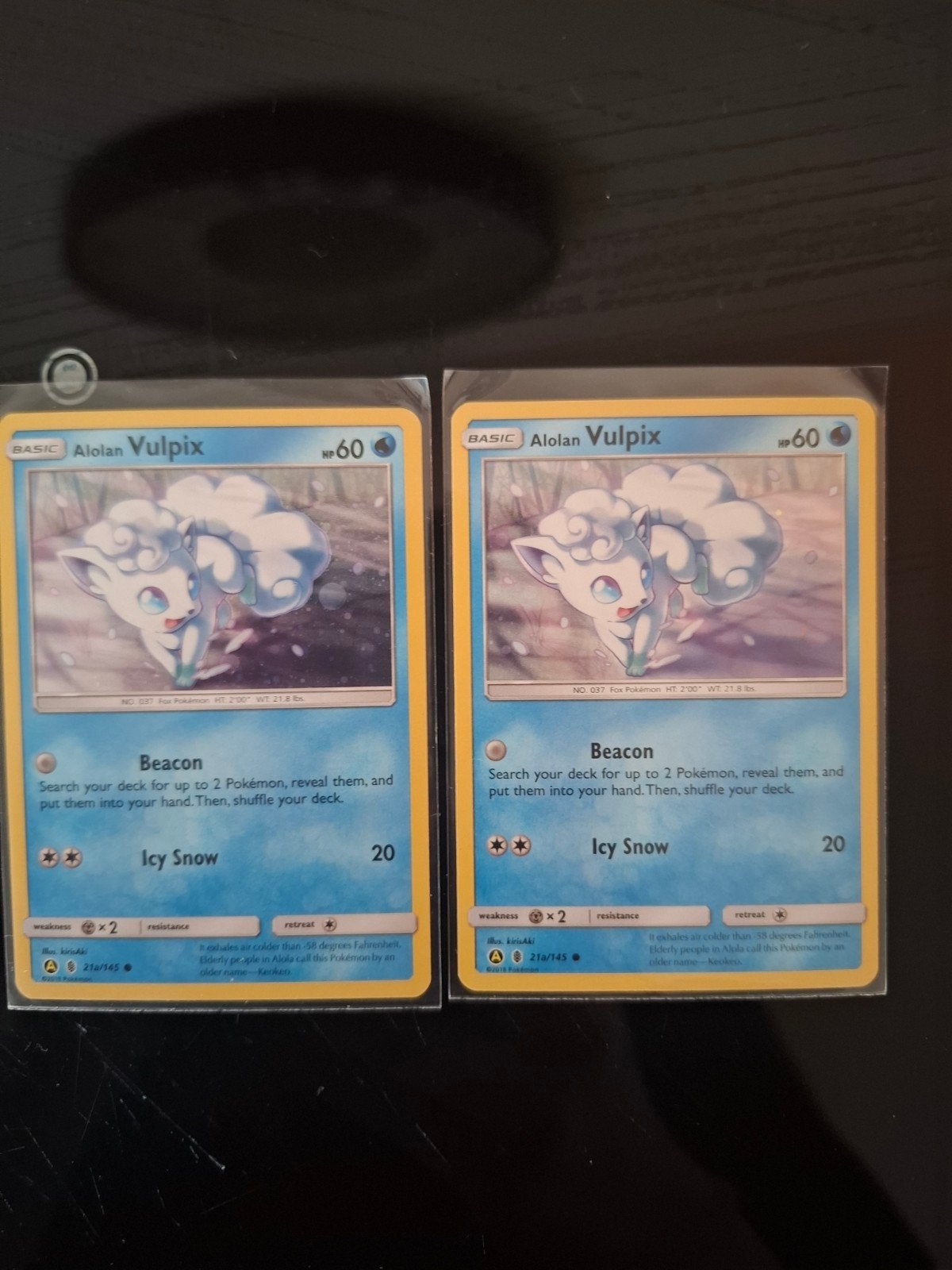 Alolan Vulpix Cosmos Holo Promo – 21a/145, Ophalen of Verzenden, Zo goed als nieuw, Meerdere kaarten, Foil