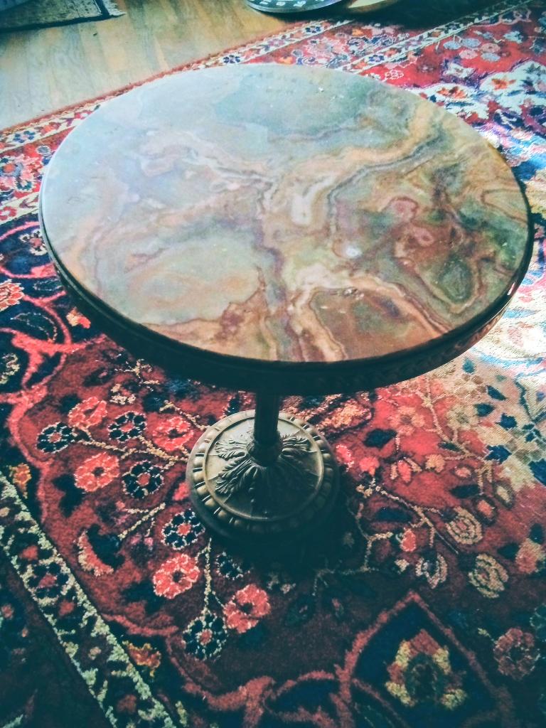 rond tafeltje met onyxblad, Ophalen