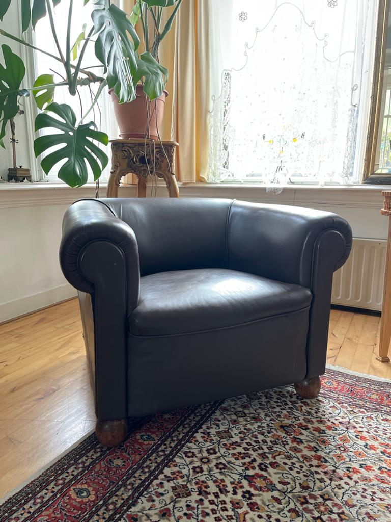 Oude clubfauteuil, Ophalen