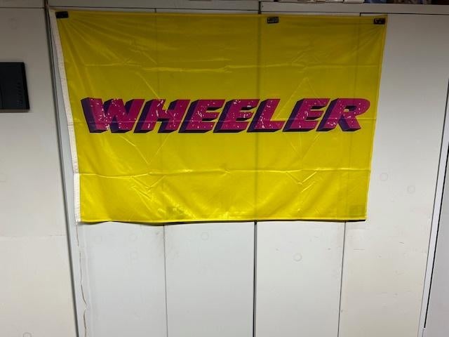 Wheeler reclame vlag, Ophalen of Verzenden, Nieuw, Reclamebord