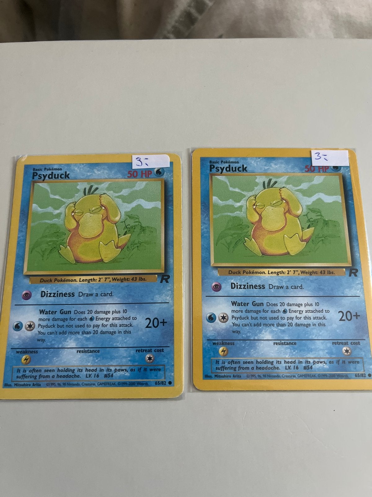 2x Team Rockers Psyduck Base50 HP), Ophalen of Verzenden, Gebruikt, Losse kaart