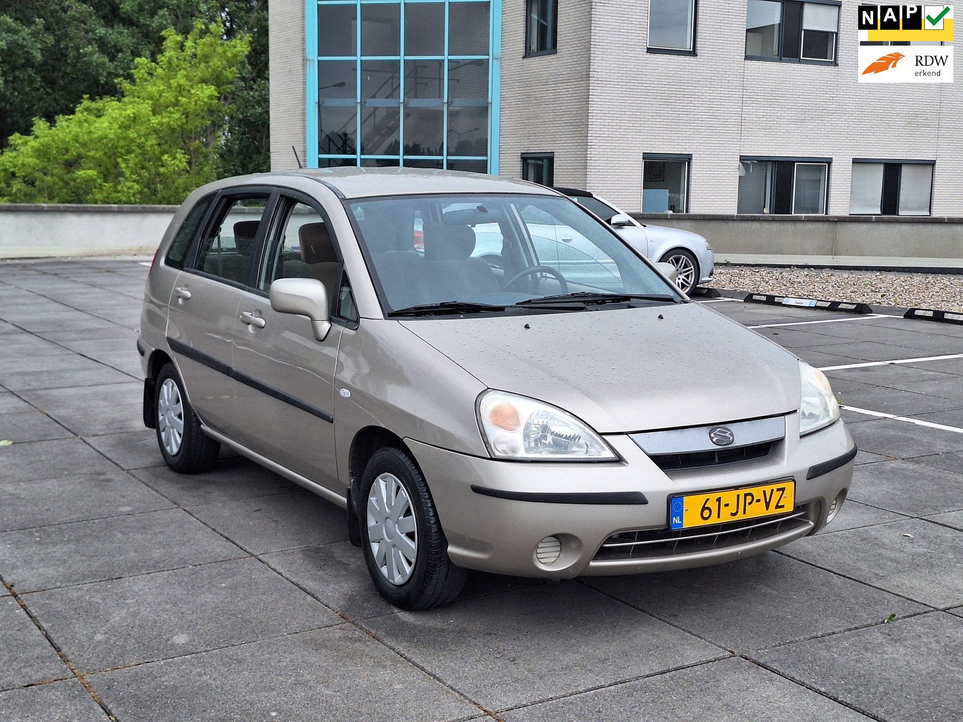Suzuki Liana €2248,-1.6 GLX Apk 07/2027 Airco + Trekhaak, Auto's, Suzuki, Voorwielaandrijving, Stof, Gebruikt, Beige