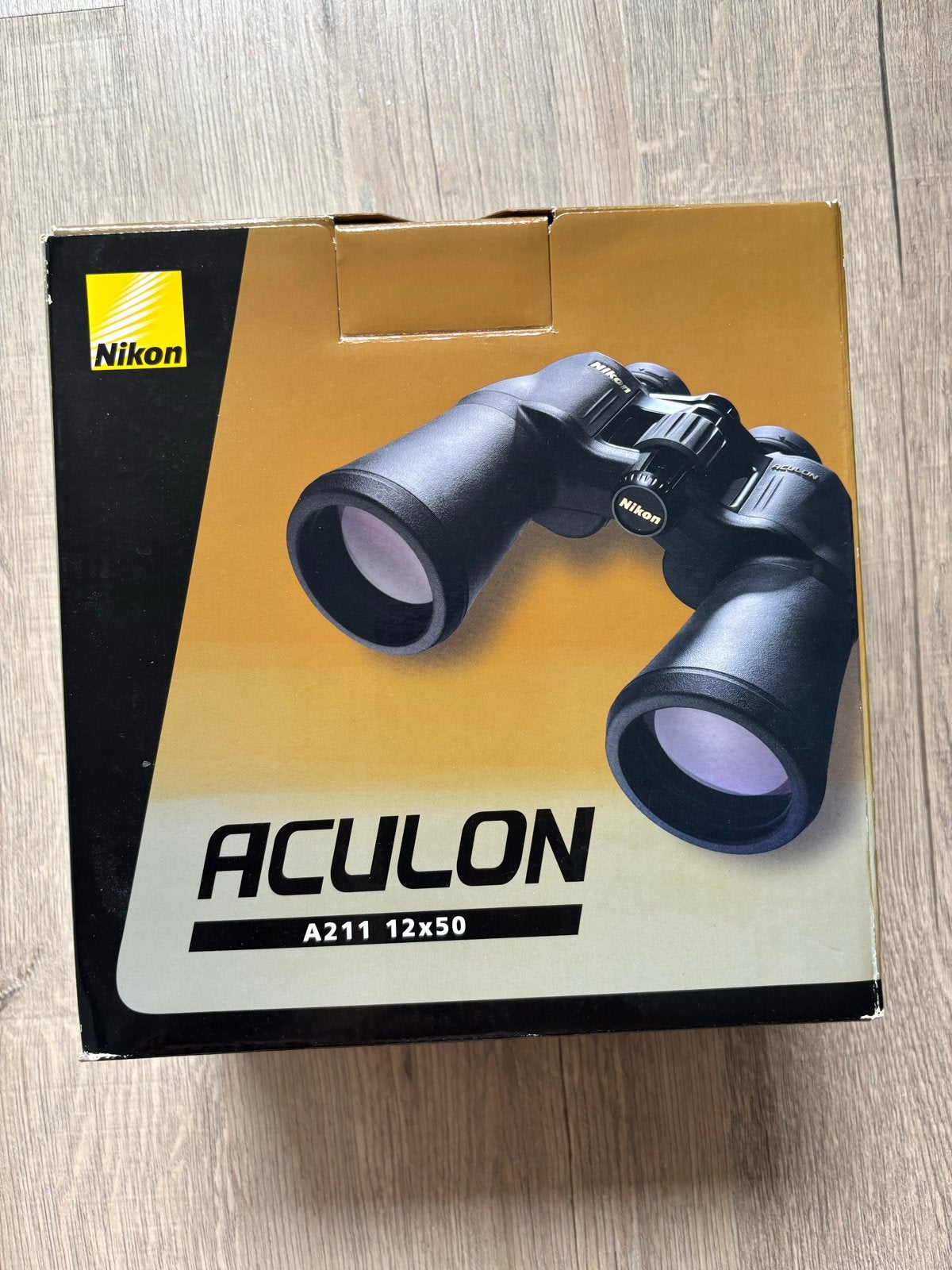 Nikon Aculon A211 12x50 verrekijker compleet, 12 tot 20x, Nieuw, Met hoes of tas, Porro (met knik)