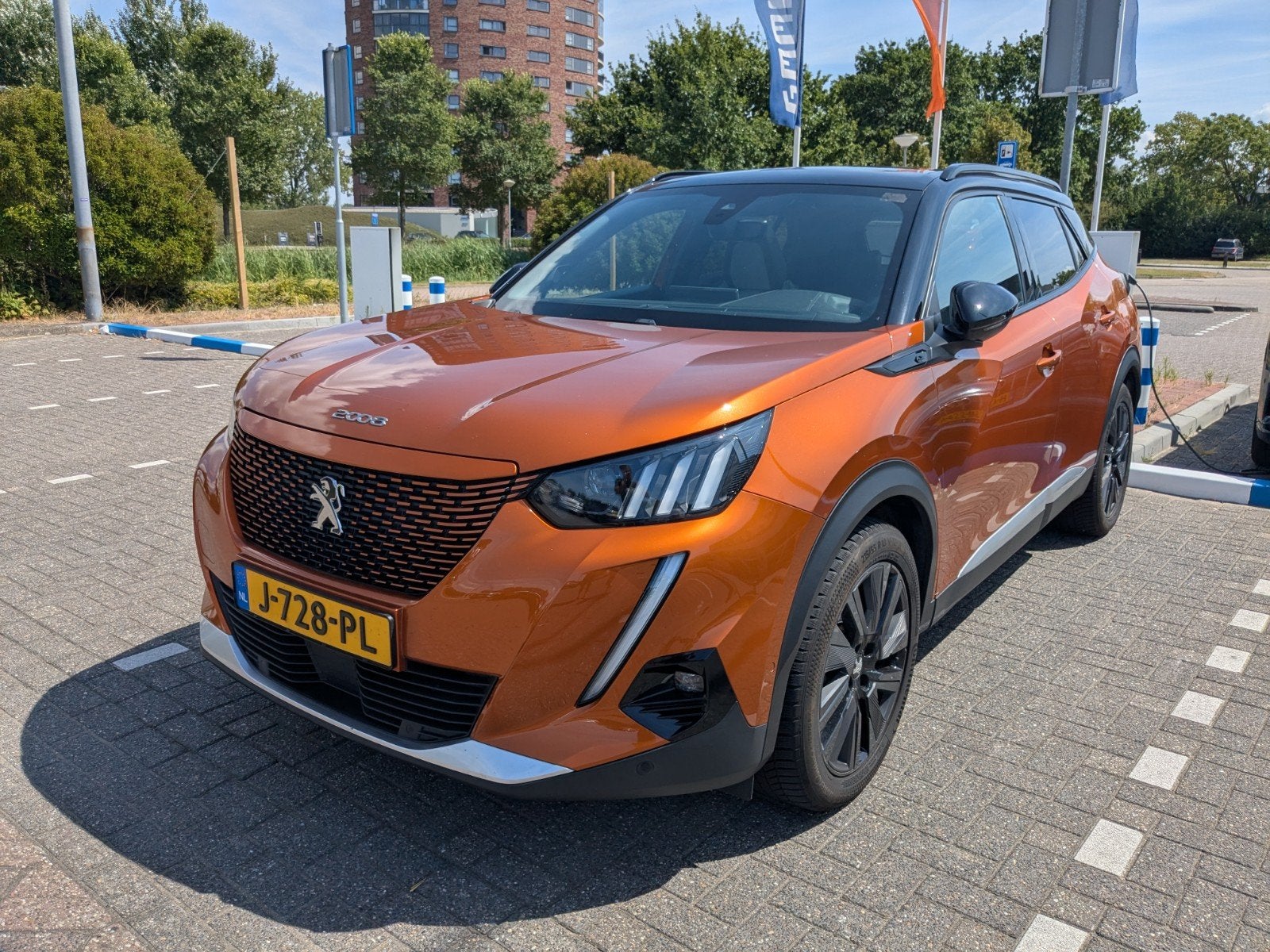 Erg mooie oranje Peugeot e2008 GT 50kWh 2020, Auto's, Peugeot, Particulier, Elektrisch, SUV of Terreinwagen, Automaat, Origineel Nederlands