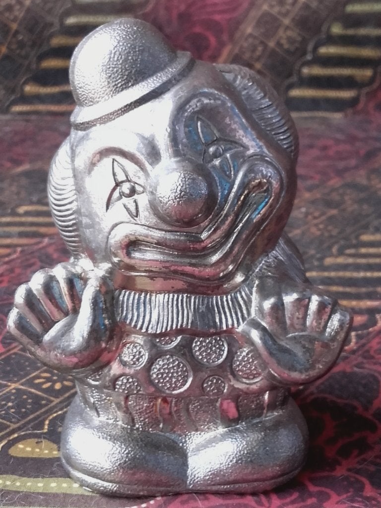 Oude vintage silverplate spaarpot uit Engeland als een clown