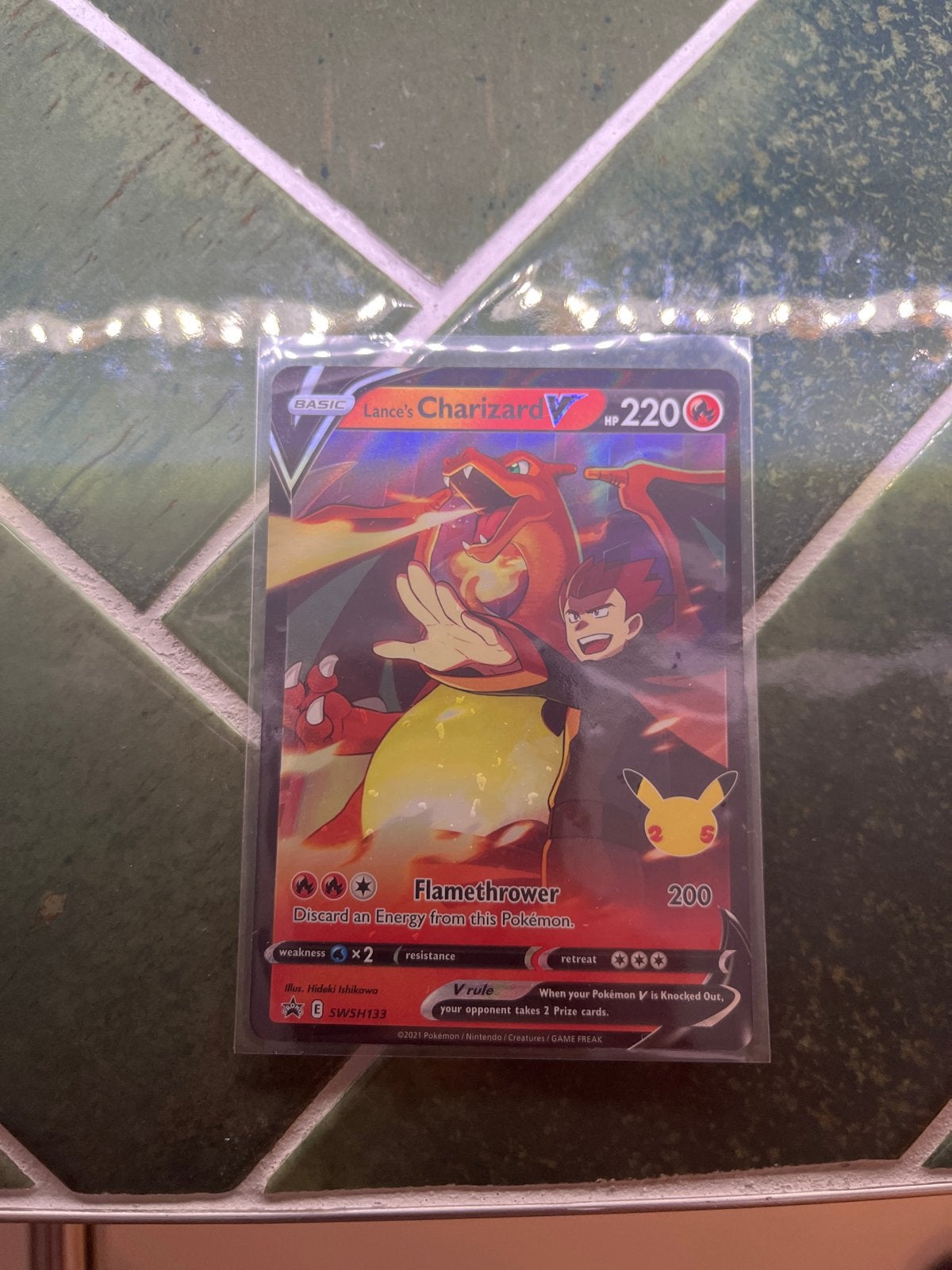 Lance's Charizard V Pokémon kaart SWSH133, Hobby en Vrije tijd, Ophalen of Verzenden, Zo goed als nieuw, Losse kaart