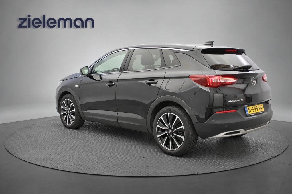 Opel Grandland X 1.6T Hybrid PHEV Ultimate - Carplay, Camera, Dealer onderhouden, 4 cilinders, Zwart, Bedrijf