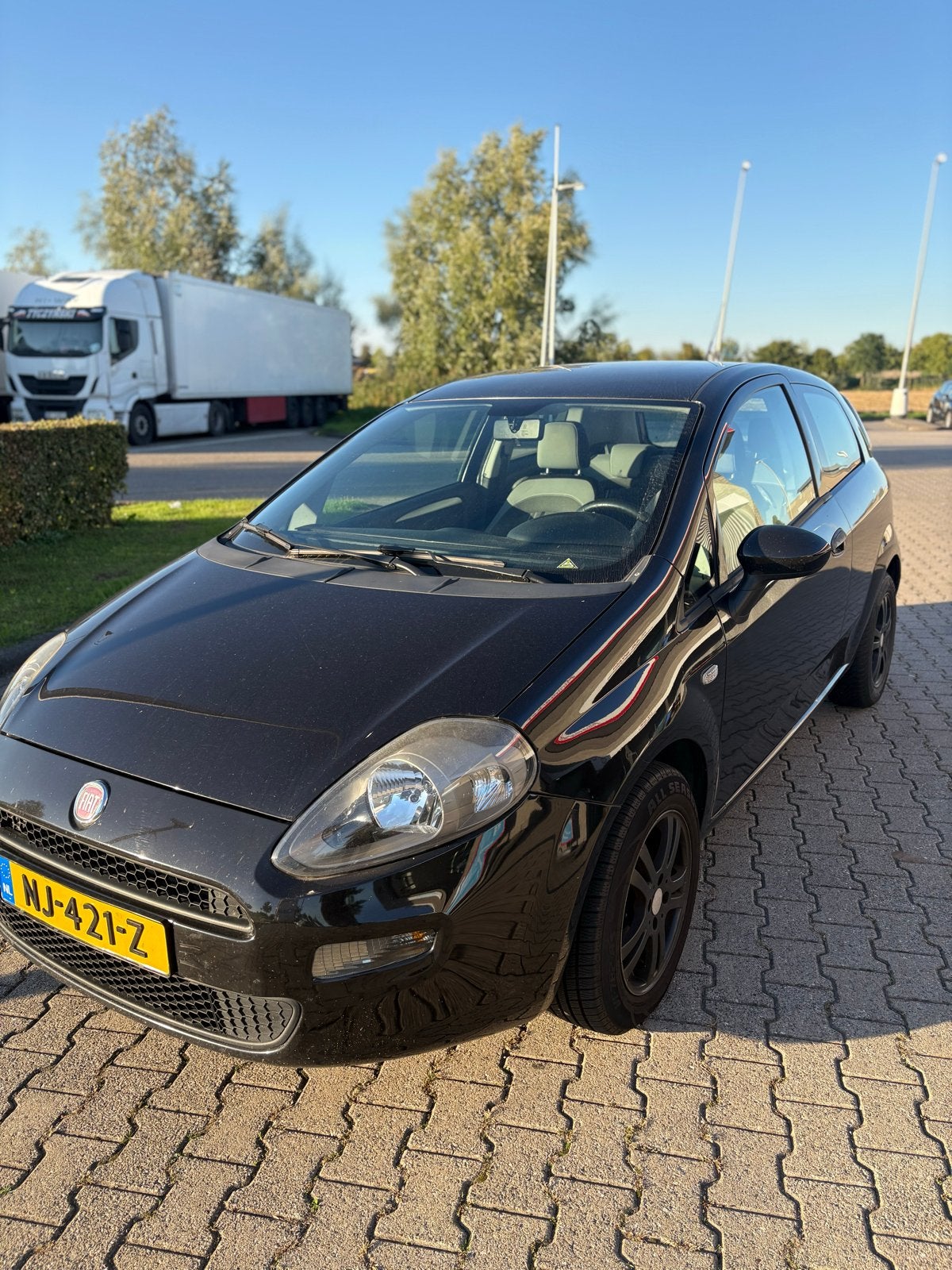 Fiat Punto 1.2 51KW/69PK 3DR Grande 2012 Zwart, Auto's, Voorwielaandrijving, Stof, 40 €/maand, 4 cilinders