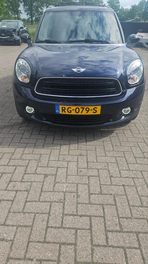 Mini Countryman 2.0 D 112pk All4 Aut. 2014 Blauw, Auto's, Automaat, 1995 cc, Zwart, Blauw