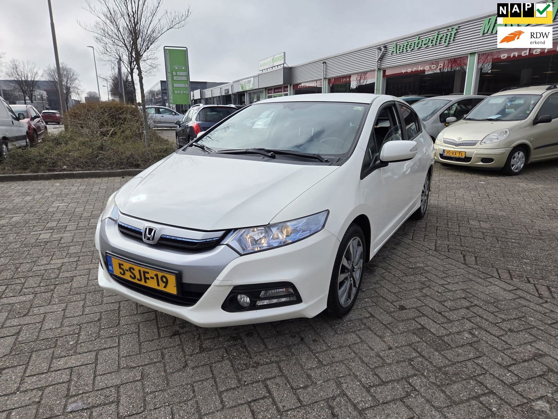 Honda Insight 1.3 Exclusive /HYBRIDE/Automaat/Clima/Cruise/L, Auto's, Gebruikt, 4 cilinders, Leder en Stof, Bedrijf