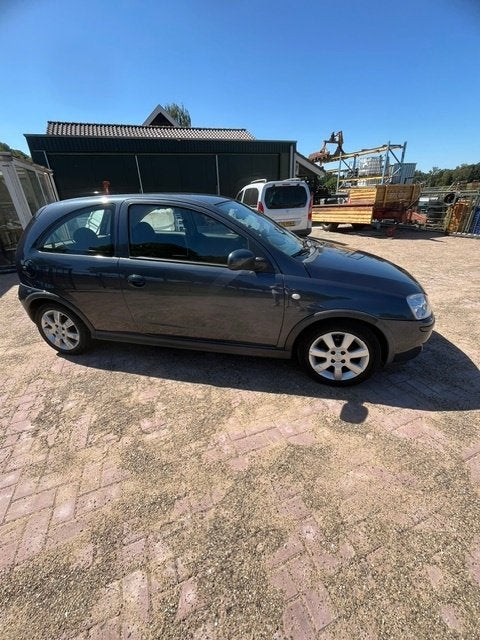 Opel Corsa 1.2 16V Twinport 3D 2006 Grijs, Auto's, Opel, Voorwielaandrijving, 450 kg, 31 €/maand, 4 cilinders