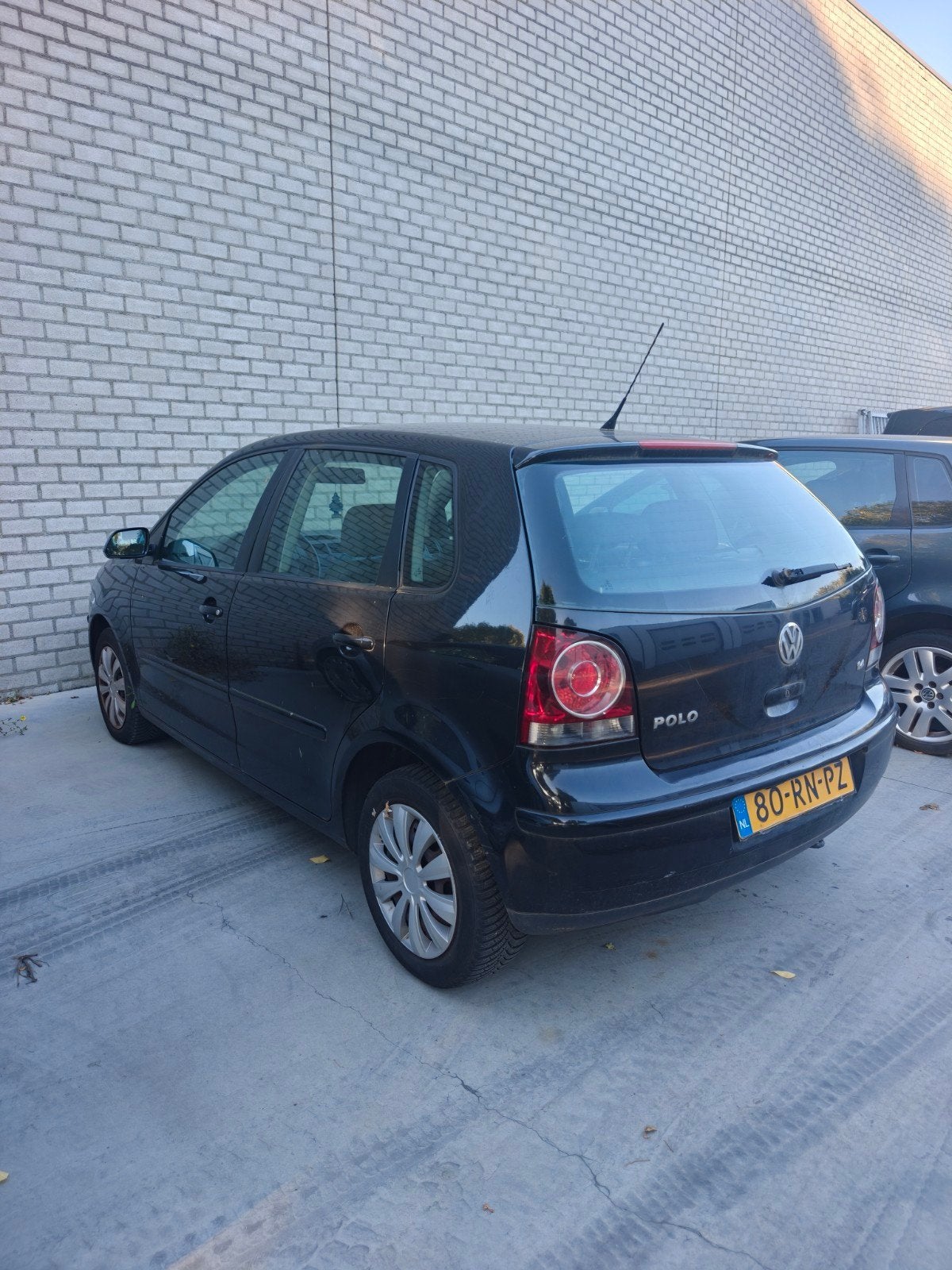Volkswagen Polo 1.4 55KW 2005 Zwart, Auto's, Voorwielaandrijving, 15 km/l, 74 pk, Zwart