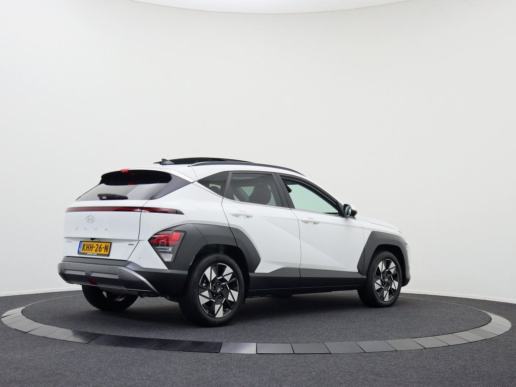 Hyundai KONA 1.6 GDI HEV Premium Sky | Panoramadak | Occ.Lea, Dealer onderhouden, Gebruikt, Wit, Leder
