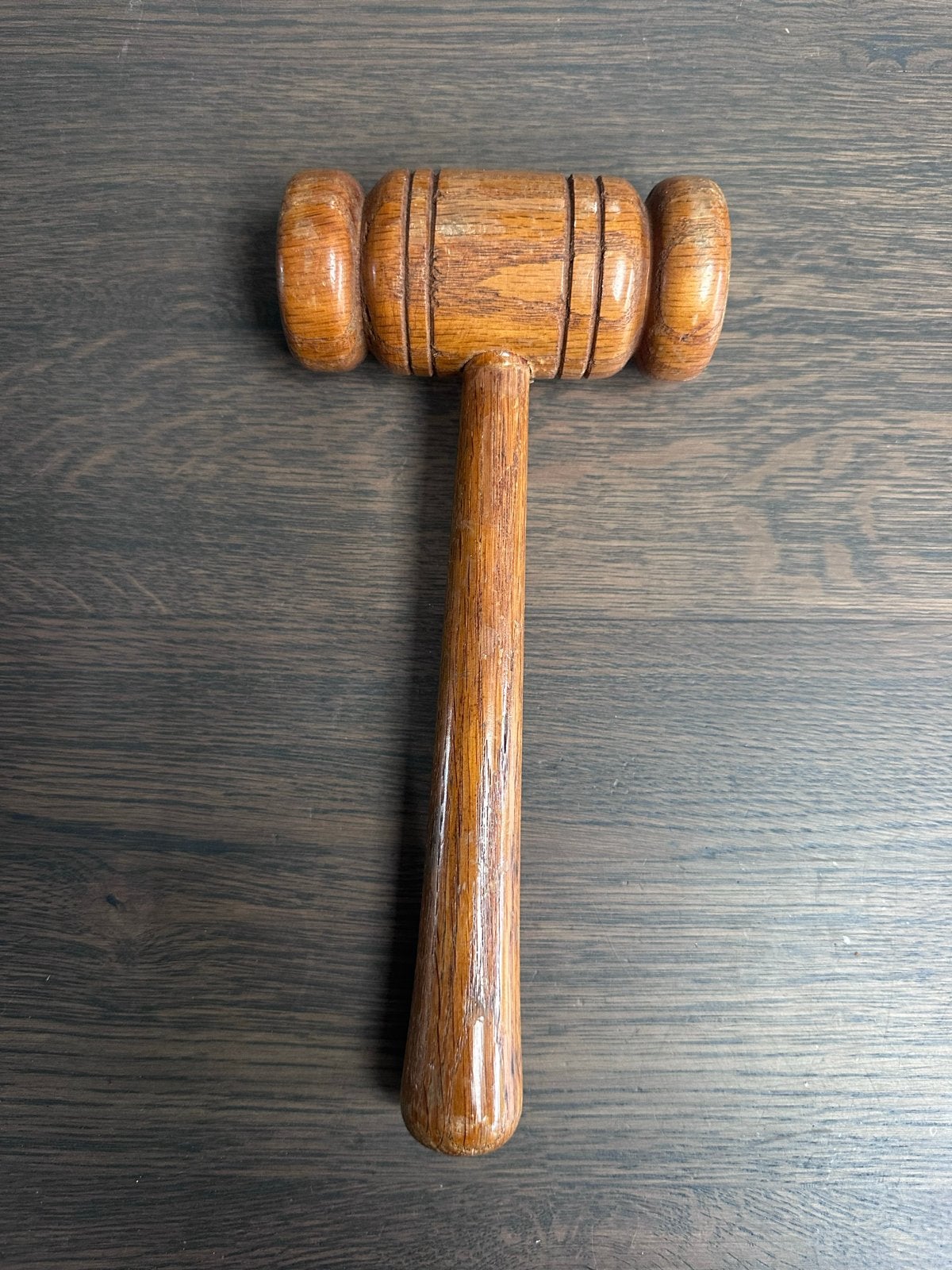 Houten veilinghamer, Ophalen